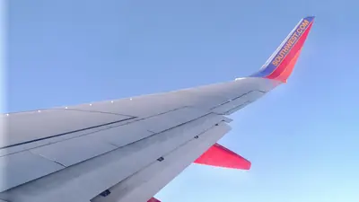View of an airplane wing from a passenger window