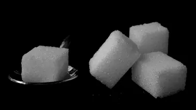 Sugar cubes on a dark background